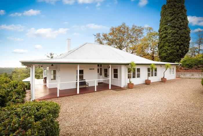 Farmhouse and gravel drive